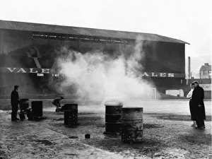 00606 Prints: Sport - Football - Swansea City - Vetch Field - Groundsmen try to soften the frozen Vetch