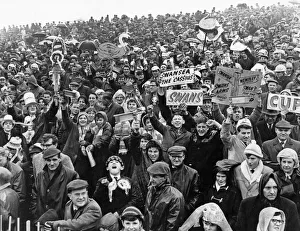 Cheer Prints: Sport - Football - Swansea - Swansea fans brave the rain during the FA Cup Semi-Final