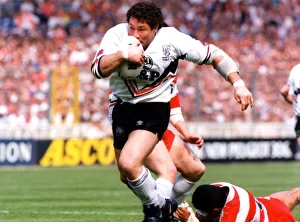 Sport - Rugby League - Kurt Sorensen powers through to score Widnes