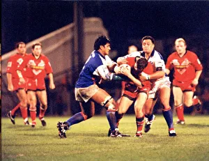 00369 Prints: Sport - Rugby League - Wales v Western Samoa - Rowland Phillips drives on despite strong