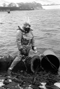 Sport. Scuba Diving: Generic pictures diving into a reservoir. December 1969 Z12553