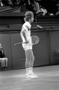 00070 Prints: Sport: Tennis. John McEnroe gets an tied up in his Centre Court Wining Wimbledon Semi