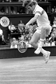 Sport: Tennis. John McEnroe gets an tied up in his Centre Court Wining Wimbledon Semi