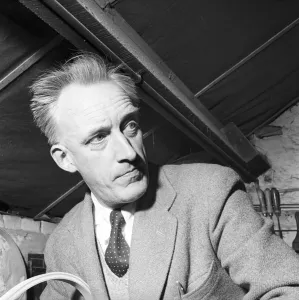 Craftsman Prints: Sport: Tennis: Mr. B. Shepherd seen here making a tennis racket in the workshops of