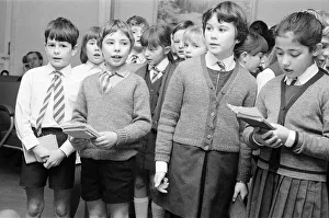 St Josephs Primary School, children singing to elderly at the Old Peoples Centre in