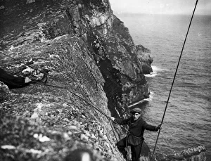 A St Kildan fowling on the cliffs of Hirta the main Island in the St Kilda archipelago
