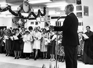 Staff of Owen Owen gather on the sales floor for their traditional Carol Service