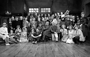Stars of the popular wartime comedy television programme Dads Army toast pose for a group
