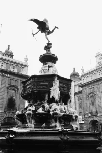 Seasonal Prints: The statue of Eros in Piccadilly Circus covered in ice after a chilly Christmas