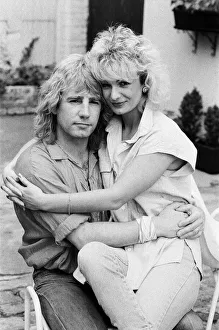 Girlfriend Prints: Status Quo band member Rick Parfitt and his new girlfriend Patty Beedon. 12th July 1985