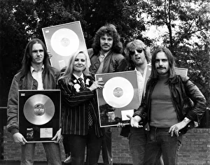Status Quo Prints: Status Quo, are presented with more Gold and Platinum Discs at The Eurocrest Hotel