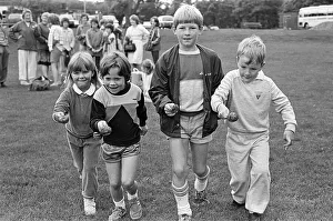 Sports Day Prints: A steady hand and a keen eye is needed in the potato and spoon race at Holme Valley