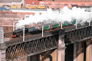Carriages Prints: Steam locomotive 44767 George Stephenson leaves Newcastle over the Kinge George Bridge