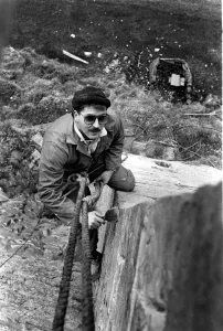 Castle Prints: Steeplejack David Stone at work on Lindisfarne Castle on 11th November 1988