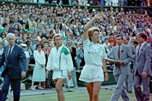 Grass Prints: Steffi Graf pictured with a winning wave to the crowd as she walks off after the match