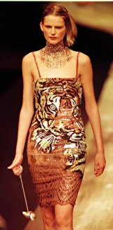 1990s Fashion Prints: Stella Tennant models dress with tiger motif designed by Valentino at Paris Fashion Week