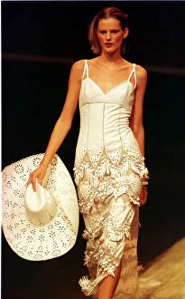 00512 Prints: Stella Tennant sports a cream cowboy dress October 1997