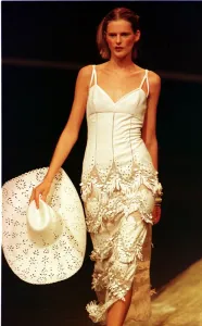 Stella Tennant sports a cream cowboy dress October 1997