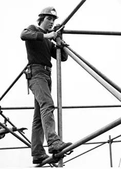 Apprentices Prints: Stephen Swales, of Middlesbrough, stands tall as he fixes scaffolding