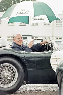 Sterling Moss in a C-Type Jaguar which he piloted to Le Mans 40 years ago