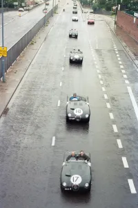 Sterling Moss takes takes Evening Telegraph reporter Alan Poole for a spin in the same