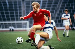 00241 Prints: Steve Archibald Aberdeen football player is tackled by Joe McLaughlin of Morton in a