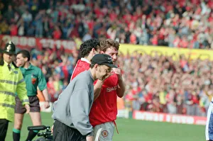Steve Bruce, congratulated by Ryan Giggs (number 11) pictured at the end of the match