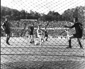 Scotland Prints: Steve Chalmers (centre) leaves goalkeeper Giuliano Sarti standing as he fires in