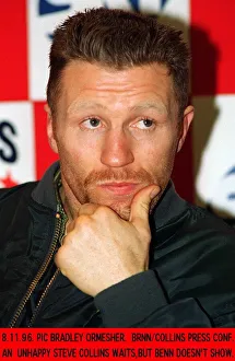 Steve Collins Boxer waits at a news press conference for Nigel Benn to show up