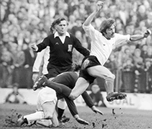Steve Heighway of Liverpool flies through air March 1975 after a tackle by Peter