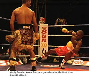 Steve Robinson hits the canvas floored by Prince Naseem Hamed during WBO featherweight