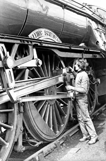 00347 Prints: Steve Sandever, job creation supervisor at Cornforth Steam-town checking the lubrication