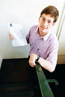 Steven Clark proudly shows off the national certificate he gained in Business Admin