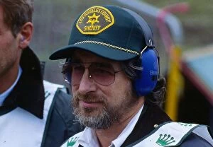 Images Dated 15th August 1997: Steven Spielberg Cancer Research shoot Gleneagles 1997 baseball cap ear protectors
