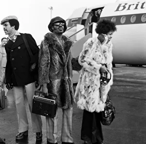 Blind Prints: Stevie Wonder arriving at London Airport with Yvonne Wright. 24th January 1974