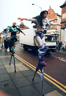 00087 Prints: Stiltwalkers Full tilt at the North festival at Chester-le-Street in 1993