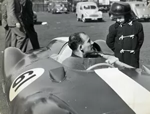 01419 Collection: STIRLING MOSS IN HIS COOPER CLIMAX CHATS TO GEOFFREY BRABHAM, AGED 4 OF SYDNEY, AUSTRALIA