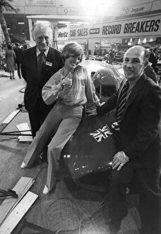 01419 Collection: Stirling Moss with Lord MOntagu and Tania Bern at motor show - october 1977