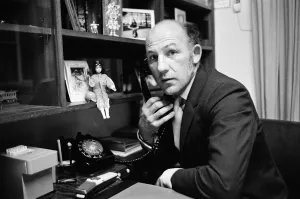 Stirling Moss pictured in his office / home in Shepherds Market, London. 3rd August 1973