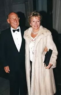 01419 Collection: Stirling Moss and wife Susie wearing a fur coat at sports awards ceremony - December 1994