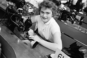 Stitching a upper of a shoe at the H Solomons shoe factory in Tottenham. 30th July 1956