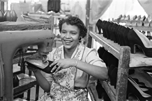 Stitching a upper of a shoe at the H Solomons shoe factory in Tottenham. 30th July 1956