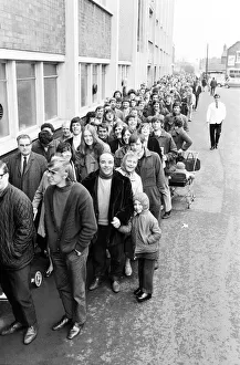 00349 Prints: Stoke City fans queue outside the ground for tickets ahead of FA Cup semi final replay