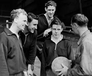 00329 Collection: Stoke City Trainer Jack Marshall (right), has a word with newcomers (left to right