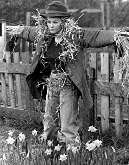 Stone the crows - a human scarecrow. Beauty queen Fran Murphy grows the prettiest flowers