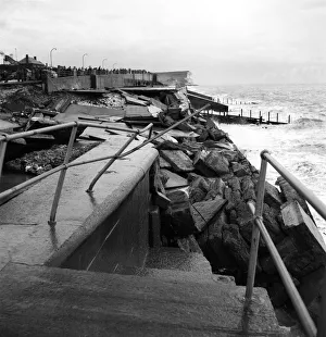 Coast Prints: Storm damage on the promenade at Seaford. Fierce gales have swept the British Isles