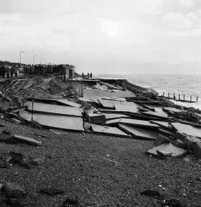 Storm damage on the promenade at Seaford. Fierce gales have swept the British Isles