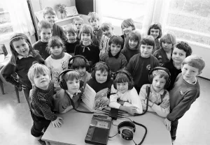 Languages Prints: Storytime - third year infants at Brockholes CE Junior and Infants School tune into a