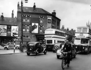Bike Prints: Stratford Road, Sparkbrook, West Midlands - traffic moving along the main road past