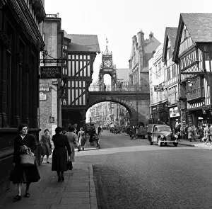 Street Scenes Prints: Street scenes in Chester with a view of the Eastgate and Eastgate Clock, Cheshire